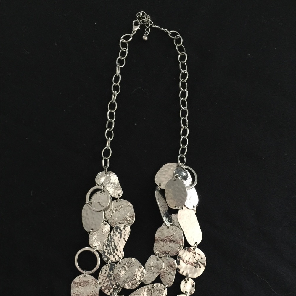 Fun silver necklace.